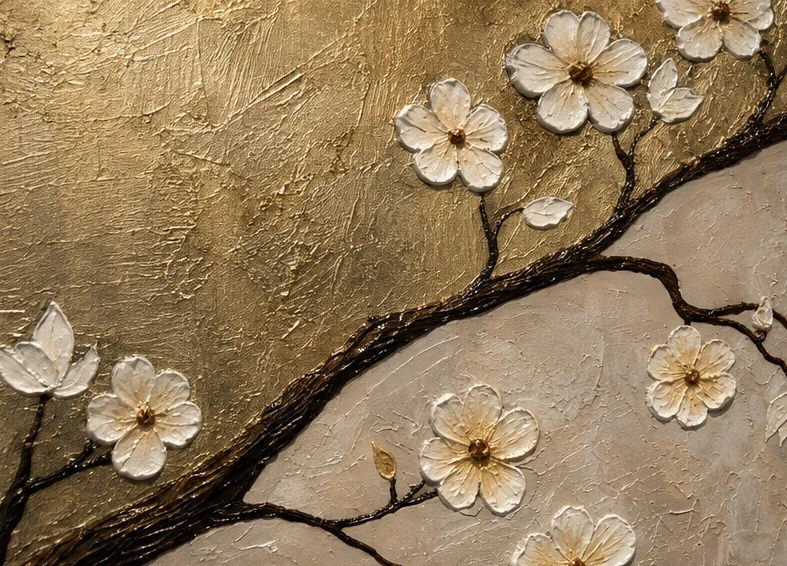 Close detail of individually sculpted white petals with gold centres standing in relief