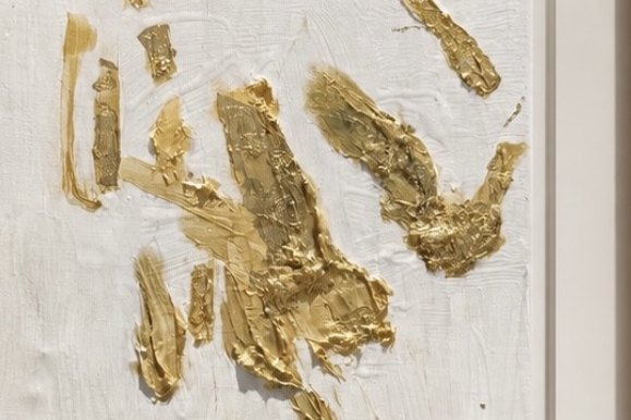 Close detail of thick palette-knife gold strokes